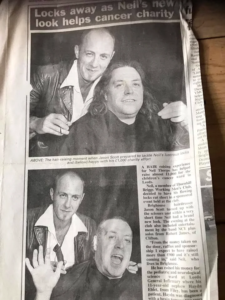 Newspaper story about Jason Scott taking part in a charity haircut